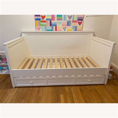 Accommodates twin size mattress for daybed and trundle mattress for trundle (each sold separately). . Pottery barn trundle bed